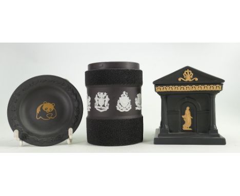 A collection of black Wedgwood Jasperware to include: Lemon on black lidded temple candlestick, white on black cylindrical li