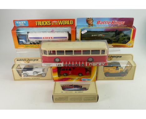 A collection of boxed model vehicles including: Matchbox Battle King K-115, Ertl International Transtar II with Tanker, Solid