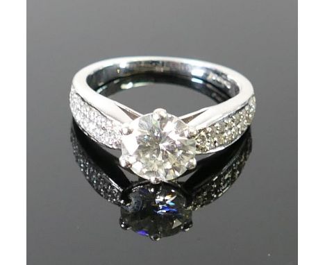 9ct white gold and white stone cubic zirconia or mossanite ring: Stone measures 1.75ct on gauge, ring size L/M. Tiny stone mi