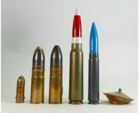 A collection of military shells: including 2 first world war German brass Pom Pom shells, two later metal shells, trench art 