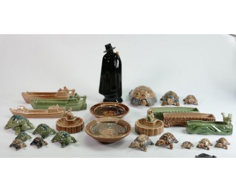 A collection of Wade pottery: Including barge dishes, Tortoises in different sizes and colours, Sandman's Port flask etc. (28