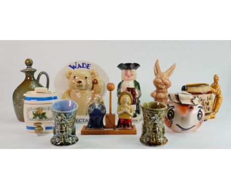 A collection of Wade pottery: Including Bisto Kids cruet set, Charrington toby jug, Golf Caddie teapot, Irish Wade, decanters