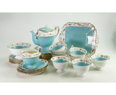 A collection of Shelley Gainsborough shape Blue Forget Me Not tea ware including: Teapot, 8 cups, 11 saucers, side plate, bre