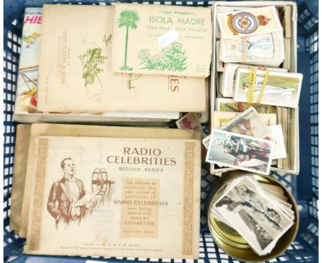 A collection of vintage cigarette cards: including complete albums including Wills, John Players etc (approx 20 albums and bo