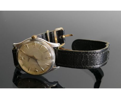 Longines Gents wrist watch in steel case: Measures 34mm diameter excluding button.  Winds, hand set and runs.  Dating from 19