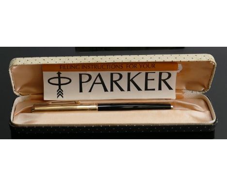 Parker 65 fountain pen 14ct nib: Black and gold in original case and leaflet. 