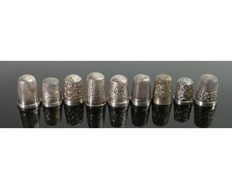 A collection of vintage silver thimbles (9): 