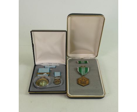 Two boxed US Army military medals: comprising Commendation For Military Merit and United Nations Defence Korea large and mini