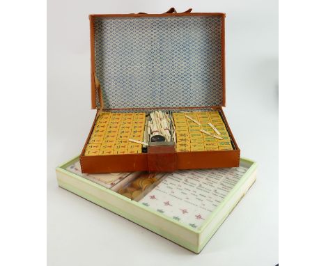 Two cased Chinese Mahjong Sets: one item noted with bone markers 