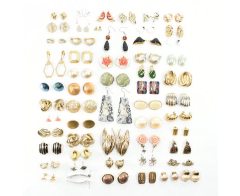 An assorted collection of costume jewellery earrings. The lot to include; gold &amp; silver tone metal, clip on earrings, stu