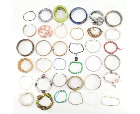 An assorted collection of costume jewellery bracelets. The lot to include; bangles, bracelets, gold &amp; silver tone metal, 