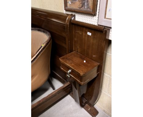 A mid 20th Century French mahogany framed double bedstead in the Art Deco taste, the headboard of typical Continental form wi