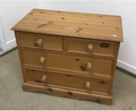 A modern pine chest of two short over two long drawers on a bracket foot base, 89 cm wide x 45 cm deep x 73 cm high, a pine b