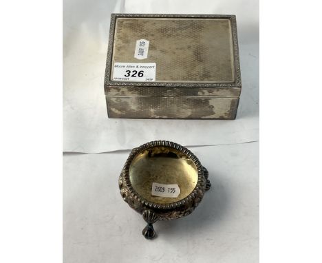 A George VI silver cigarette box with engine turned decoration and scrolling foliate border (by A&J Zimmerman Ltd, Birmingham