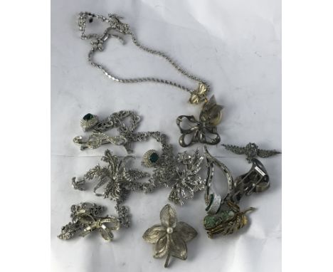 A collection of costume jewellery to include various marcasite set brooches, etc, a silver pendant, a silver cased pocket wat