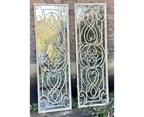 ARCHITECTURAL WALL MIRRORS, a pair, 162cm x 51cm, Italian style, overlaid aged metal frames. (2) 