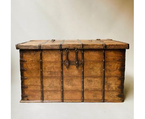 INDIAN TRUNK, 19th century North Indian, teak and metal bound with rising lid and carrying handles, 114cm W x 62cm H x 68cm D