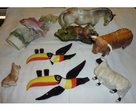 Beswick Highland cow, Corgi figurine, Royal Worcester 'Squirrel fish' designed and modelled by Robert Van Ruyckevelt figurine