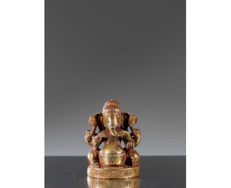 Bronze with silver and copper inlaysIndia , 18th to 19th century  Dimensions: Height 8 cm Wide 6 cm Depth 4 cmWeight: 411 gra