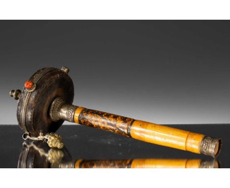 Leather and metalTibet , 18th century  Dimensions: Height 30 cm , Diameter 11 cmWeight: 258 grams Handle made of wood with me