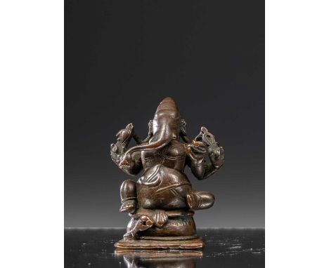 BronzeIndia 14th century  Dimensions: Height 6,5 cm Wide 5,5 cm Depth 3,5 cmWeight: 232 grams Small bronze figurine of Ganesh