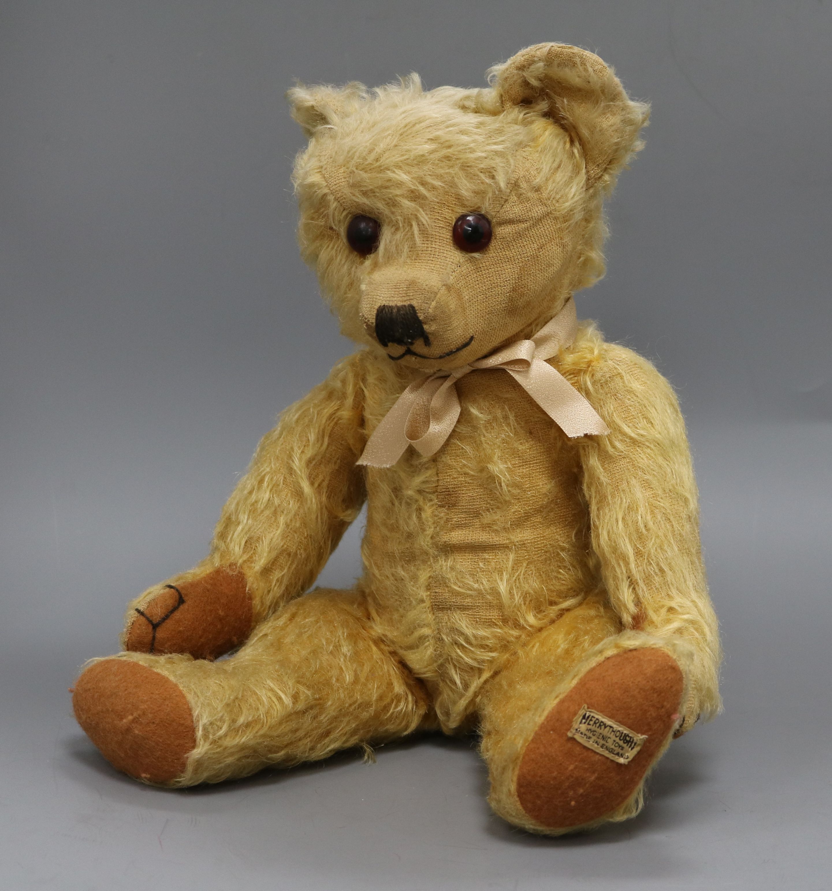 A 1930's Merrythought teddy bear, Chester, with golden mohair, large ...