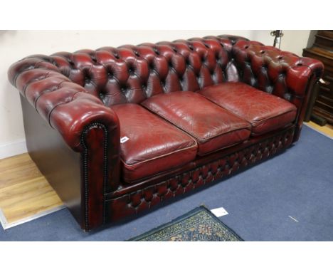 A leather button-back Chesterfield settee W.183cm