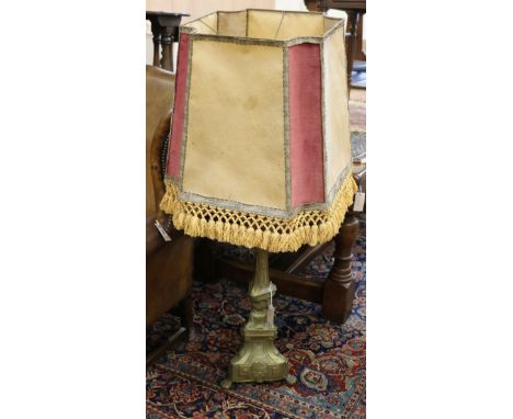 A large brass altar stick standard lamp W.29cm