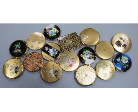 Thirty three vintage powder compacts by Stratton, including four Persian design examples, six gold-coloured examples with flo
