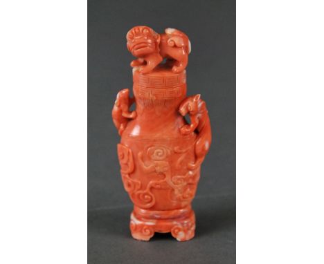 VERY FINE CHINESE CARVED CORAL VASE AND COVER  With animal handles at its side and a lion finial upon the lid.  Height 9.50 c