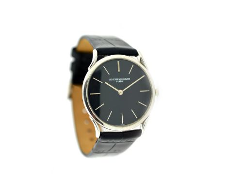 PLATINUM VACHERON CONSTANTIN ULTRA THIN WRISTWATCH Swiss, manual wind, the round black dial with applied markers, on a black 