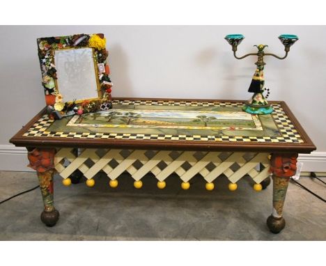 MACKENZIE CHILDS PAINTED  TRELLIS COFFEE TABLE, A TWO-LIGHT PAINTED CERAMIC CANDELABRA AND A TABLE MIRROR, Contemporary, the 