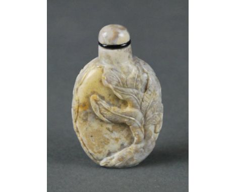 CHINESE CARVED OPAL SNUFF BOTTLE 20th century, of ovoid form with rounded shoulders.   Height 5.5 cm