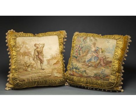 PAIR OF AUBUSSON PANELS, NOW FITTED AS PILLOWS The panels 18th/19th century, depicting either a woman seated before a tree or