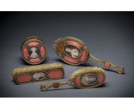 FRENCH-SWISS GILT-METAL, PAINTED IVORY AND PINK ENAMEL FOUR PIECE DRESSING SET Late 19th/early 20th century, comprising a mir