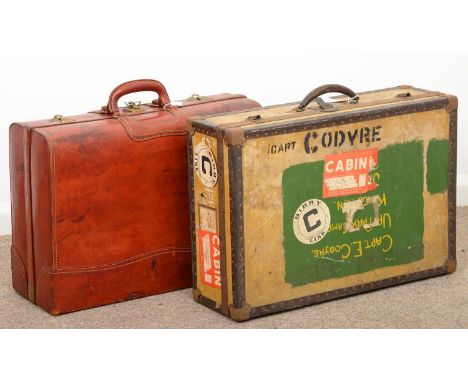 VINTAGE LUGGAGE. A RED LEATHER SUITCASE, C1950, 61CM W AND A CONTEMPORARY CABIN TRUNK, 67CM W Suitcase with scuffs and scratc