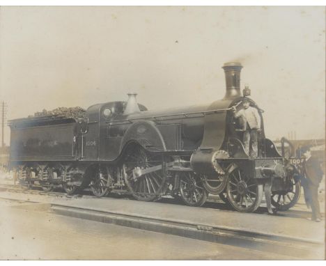 TWO VINTAGE PHOTOGRAPHS OF THE GREAT NORTHERN RAILWAY 4-2-2 LOCOMOTIVE 1004 AND 4-4-2 LOCOMOTIVE 990,&nbsp; GELATIN SILVER PR