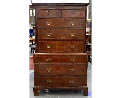 A GEORGE III OAK CHEST ON CHEST, EARLY 29TH C, THE DRAWERS WITH HOLLY AND BOG OAK CHEVRON BANDING, THE UPPER PART WITH DENTIL
