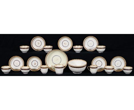 A DERBY FLUTED BLUE AND GILT&nbsp; TEA AND COFFEE SERVICE, C1790, THE SERVICE INCLUDING A SLOP BOWL, 16CM DIAM, PUCE PAINTED 