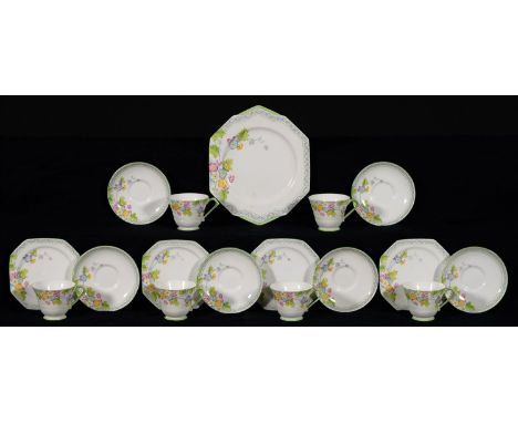A PARAGON BONE CHINA TEA SERVICE, C1935, BRIGHTLY DECORATED WITH FLOWERS IN GREY AND GREEN BORDER, THE SERVICE INCLUDING A TW
