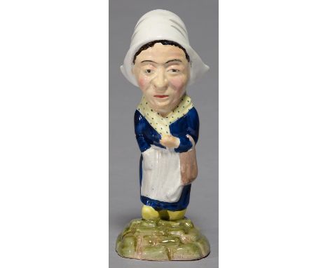 AN A J WILKINSON CARICATURE FIGURE OF A DUTCH WOMAN, MODEL 426, DESIGNED BY CLARICE CLIFF, C1925, 20.5CM H, PRINTED MARK Loca