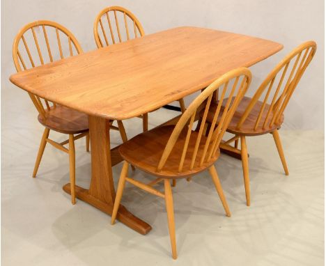 AN ERCOL ASH TRESTLE ENDED DINING TABLE WITH OBLONG TOP,&nbsp;74CM H; 80 X 152CM AND A SET OF FOUR ERCOL DINING CHAIRS, LATE 