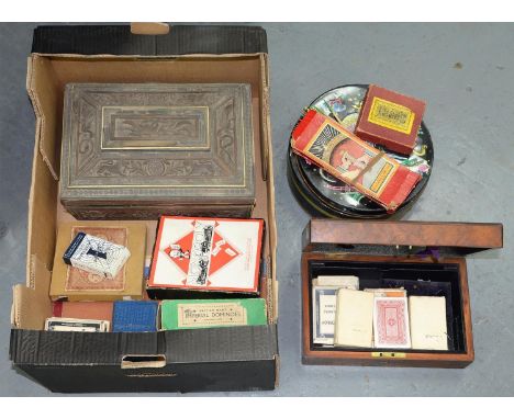 A SANDALWOOD WORK BOX, A WALNUT JEWEL BOX, VINTAGE CARD GAMES, ETC 