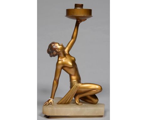 AN ART DECO&nbsp; GILT PATINATED SPELTER FIGURAL TABLE LAMP IN THE FORM OF A SEMI NAKED CROUCHING WOMAN, ON ALABASTER BASE, C