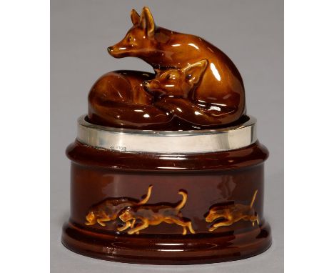 A ROYAL DOULTON SILVER MOUNTED OVAL KINGSWARE TOBACCO JAR AND COVER, MADE FOR GEORGE BETJEMANN &amp; SONS, EARLY 20TH C, THE 