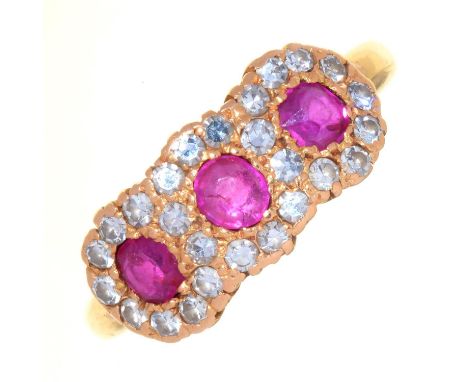 A RUBY AND DIAMOND TRIPLE CLUSTER RING, IN 18CT GOLD, LONDON 1975, 5.1G,&nbsp; SIZE N½ Good condition, some extremely slight 