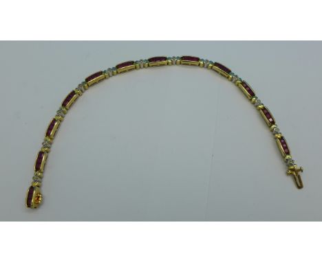 A 9ct gold, ruby and diamond bracelet, 10.6g