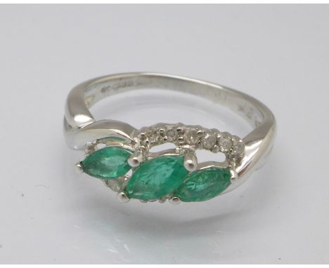 A 9ct white gold, emerald and diamond ring, 2.4g, K