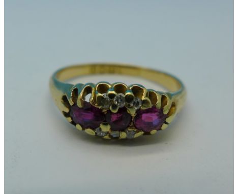 An 18ct gold, ruby and diamond ring, London 1915, 2.7g, M