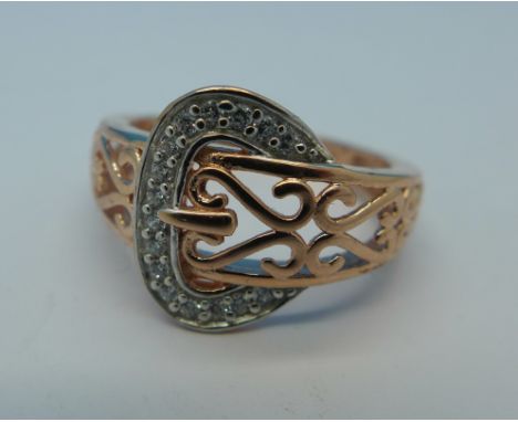 A silver gilt buckle ring, M